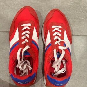 Red and White Sneakers with Blue Accents